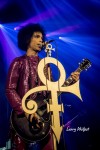 File Photo: A rare photo of Prince in performance at the Louisville Palace in Louisville, Kentucky, March 15, 2015. Used with permission. (Photo Credit: Larry Philpot)